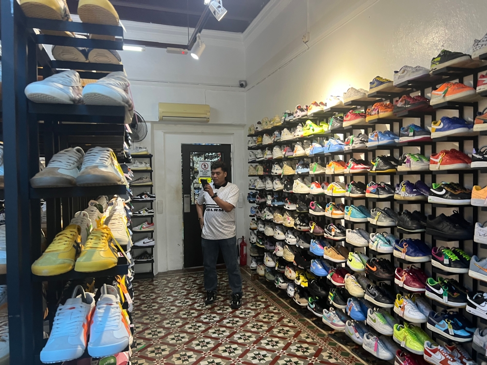 From roadside stalls to boutique success: Penang man turns hustle into thriving vintage sneakers, running shoes biz