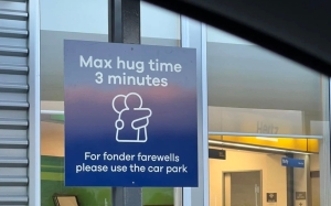 Three minutes, and off you go: NZ airport’s time limit for pre-departure hugs catches global brickbats