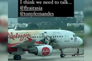 Penang mural artist tells Tony Fernandes, AirAsia ‘we need to talk’ after seeing popular artwork used on plane livery