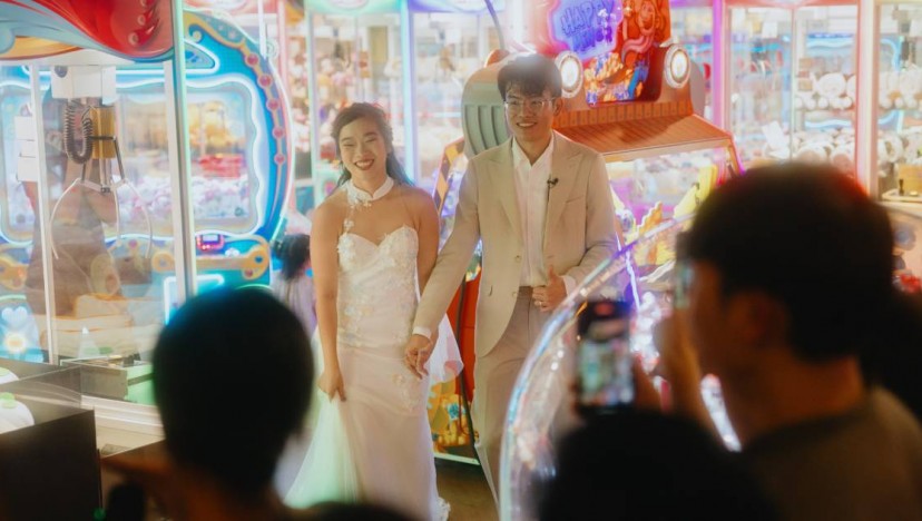 Game for love: Singaporean couple tie the knot at Timezone arcade, where they shared many dates